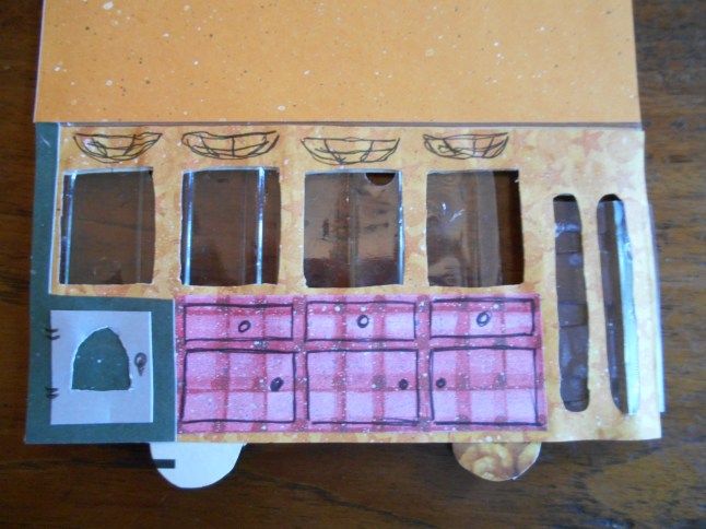 ... and stuck on some cupboards and a woodburner on one side, and drew some storage racks above the windows.