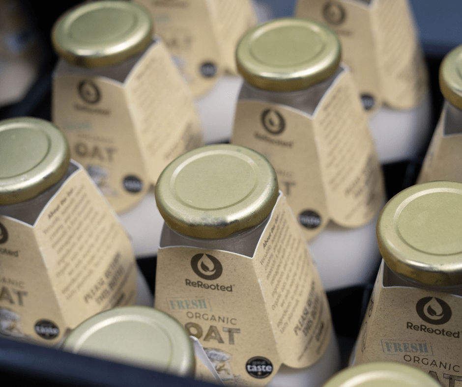 organic oat milk in refillable glass bottles